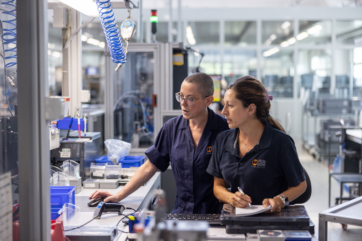 Slider metalwork employees at work
